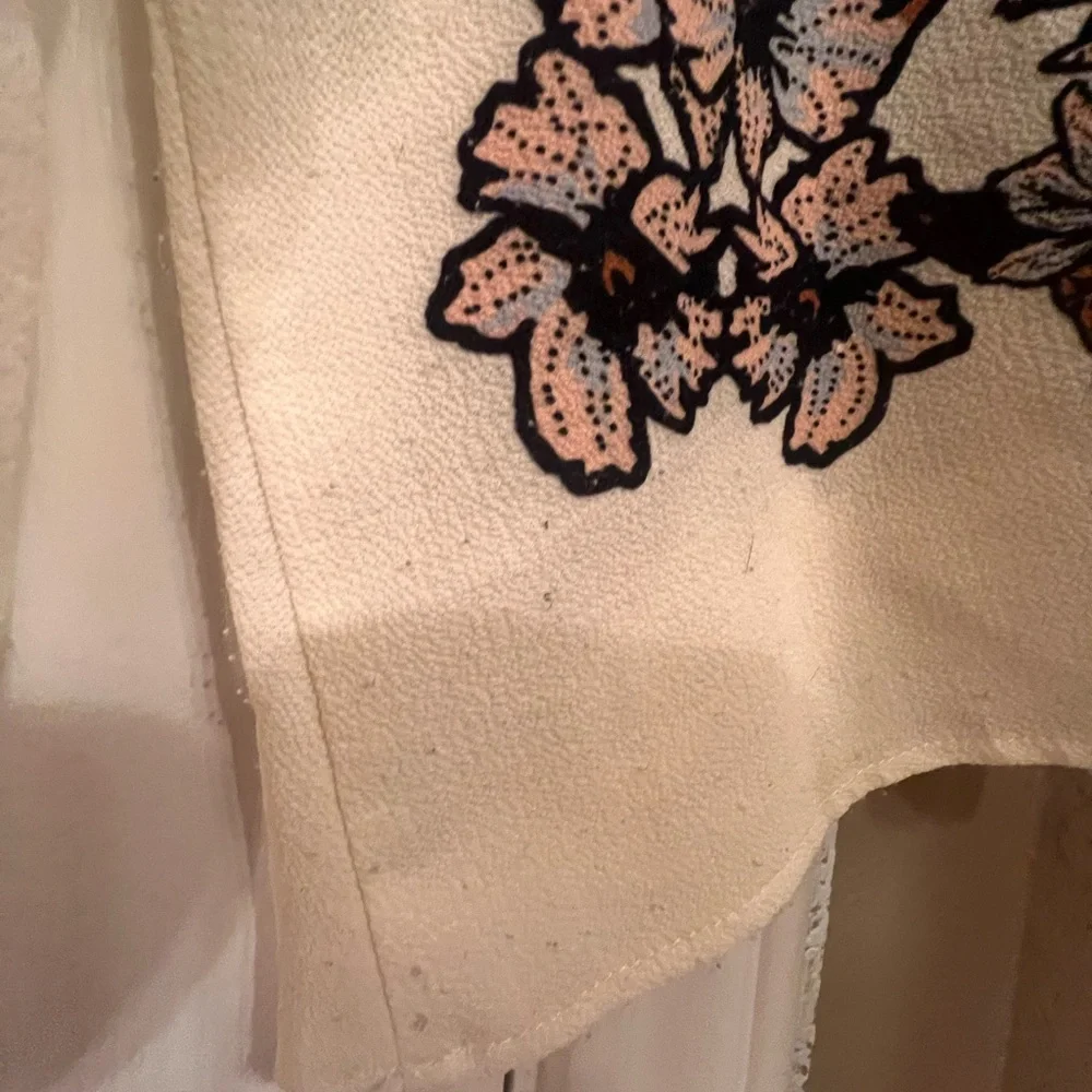 Lulumari faux cream top with floral design, size small